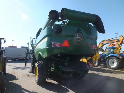 Zdjęcie przedmiotu: JOHN DEERE S690 S600 harvester + header JOHN DEERE model 635R with a header carriage