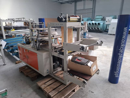 Zdjęcie przedmiotu: Maszyna do produkcji foliowych przeźroczystych rękawiczek Well-Tech Internationa Machinery WT-GM-B500