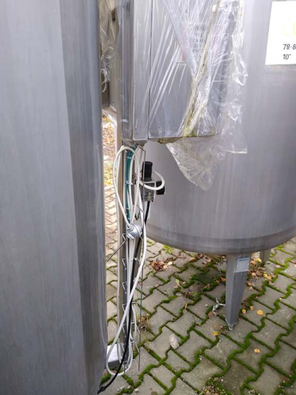 Zdjęcie przedmiotu: A line for the production of juices consisting of three units: sorting, grinding and squeezing juice as well as juice packaging and packing.