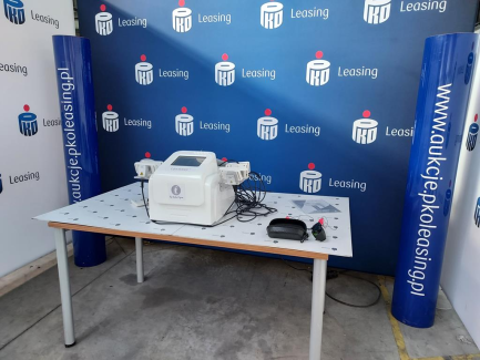 Zdjęcie przedmiotu: A cosmetic device that enables a procedure in which the cold diode laser penetrates into the subcutaneous layers and reduces the body circumference, stimulating the properties of fat cell membranes. STUDIO FIGURA Lipolaser