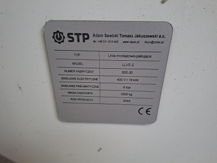 Zdjęcie przedmiotu: Linia montażowo-pakująca STP Adam Sawicki Tomasz Jakuszewski s.c. LLVS-2 przeznaczona do automatycznego umieszczania zestawu żar&oacute;wek wewnątrz kapsuły z tworzywa sztucznego