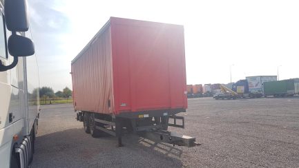 Zdjęcie przedmiotu: ORTEN AG18T Przyczepa skrzyniowa i kurtynowa z osiami centralnymi