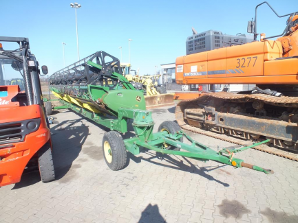 Zdjęcie przedmiotu: JOHN DEERE S690 S600 harvester + header JOHN DEERE model 635R with a header carriage