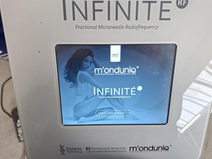 Zdjęcie przedmiotu: INFINITE RF cosmetic device used for acne scar reduction, rejuvenation, stretch mark reduction, lifting, and discoloration removal.