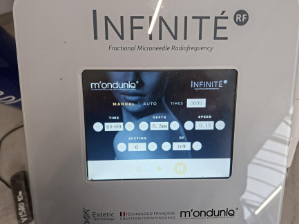 Zdjęcie przedmiotu: INFINITE RF cosmetic device used for acne scar reduction, rejuvenation, stretch mark reduction, lifting, and discoloration removal.
